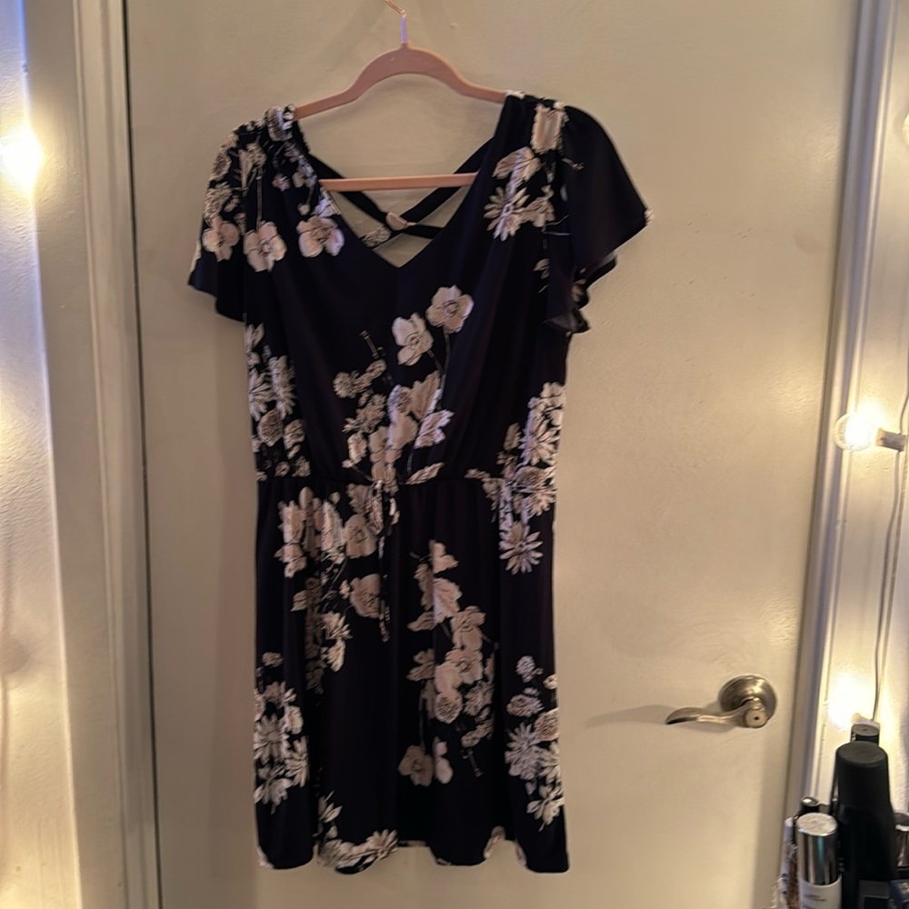 Maurice’s navy midi-dress with pink/white flowers, middle tie and cross back